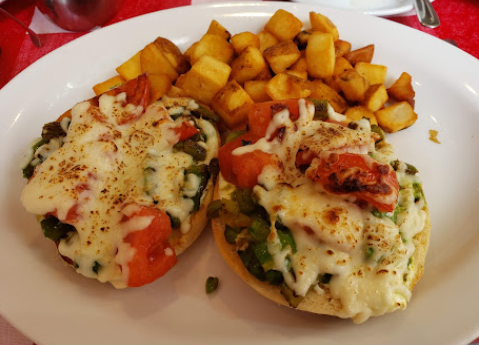 Open-faced egg dish with melted cheese